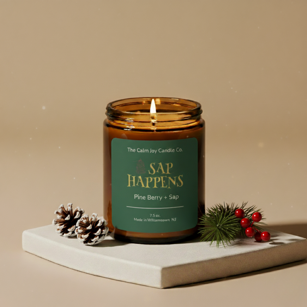 Candle with a green label on a beige background
