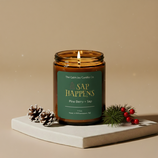 Candle with a green label on a beige background